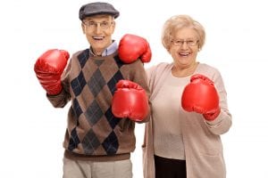 Bigstock Joyful Seniors Posing With Box 170770439 300x200