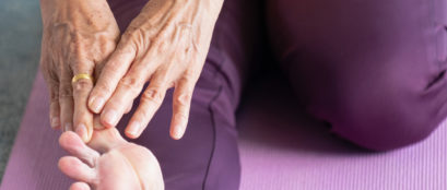 Elderly In A Yoga Exercise Posture